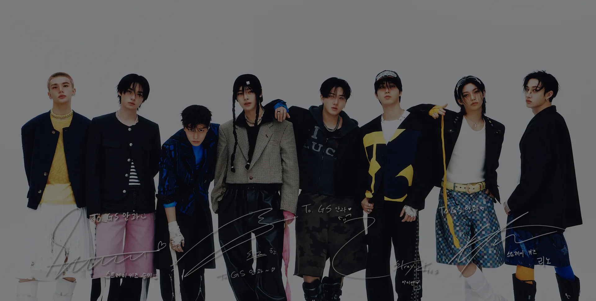 Stray Kids signed group photo dedicated to GS Eye Center