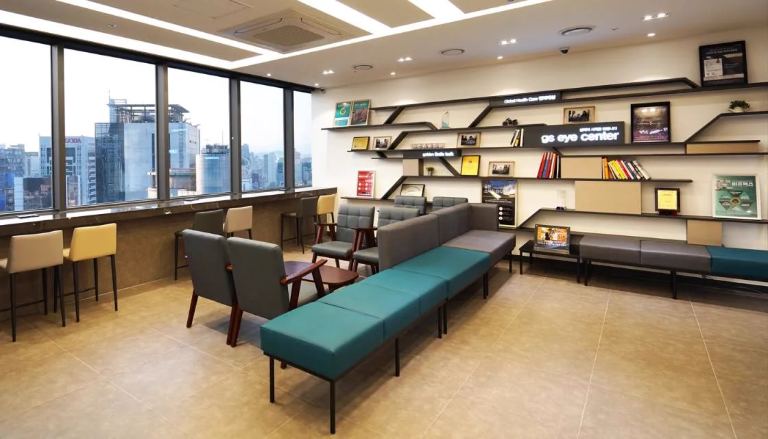 Waiting lounge with window seating overlooking the Gangnam skyline