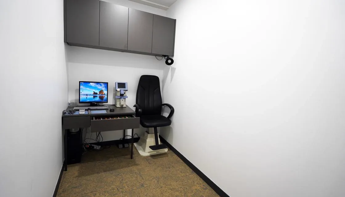 Individual exam room with refraction station