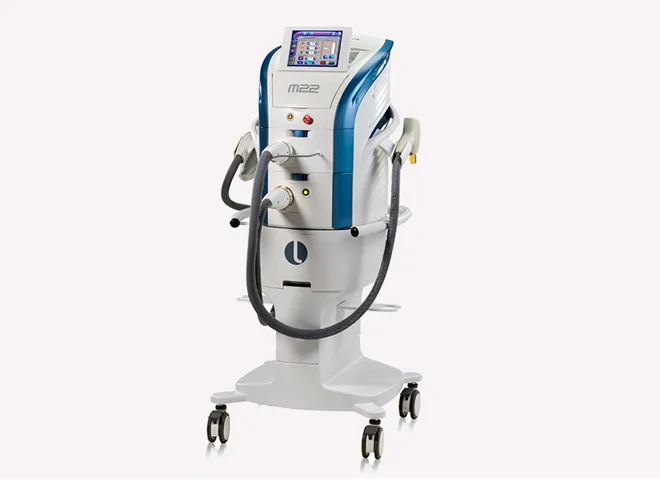Lumenis M22 IPL platform with dual handpieces on a wheeled stand