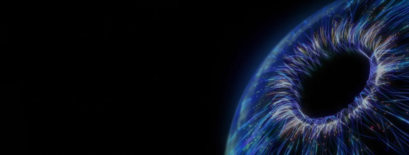 Cinematic close-up of a blue iris on black, from the GS SMILE LASIK page