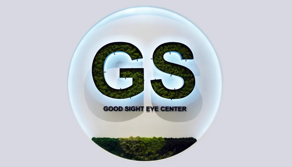 8F lobby wall with the illuminated GS Good Sight Eye Center logo filled with green moss